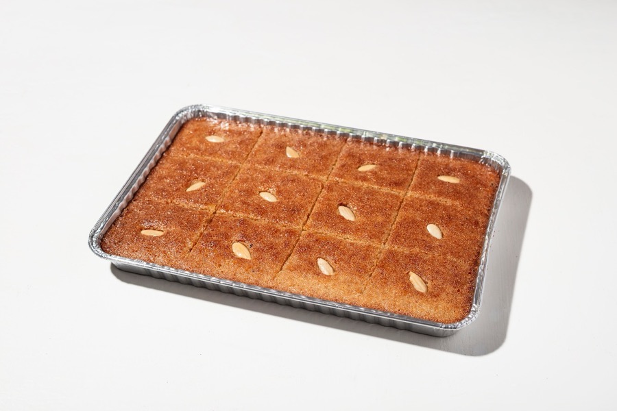 Hareeseh semolina cake with slivered almonds and pistachio