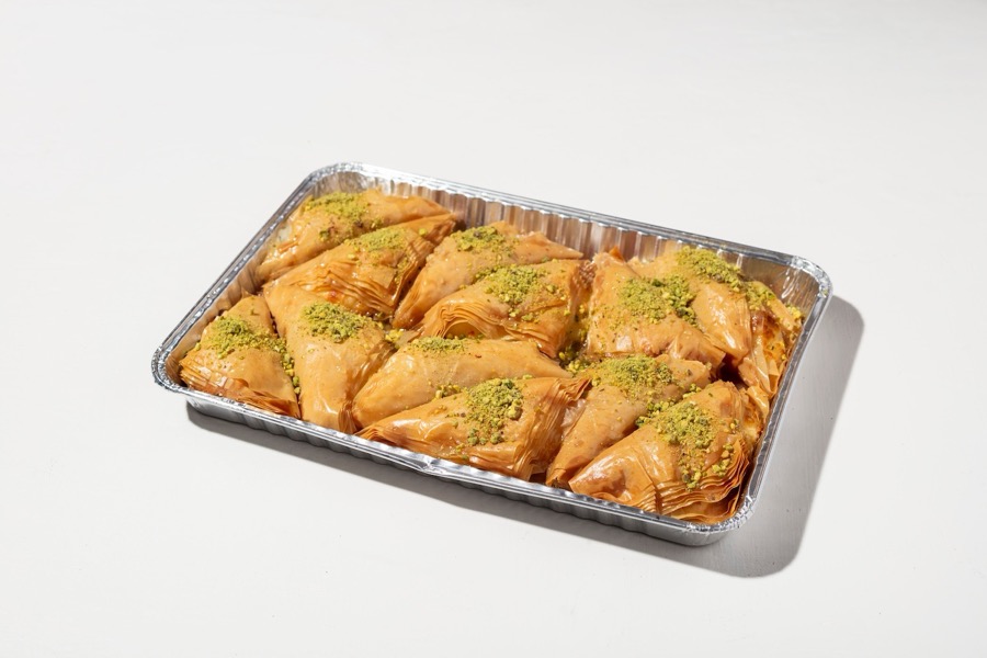 Warbat tray with creamy Qeshtah filling and pistachio